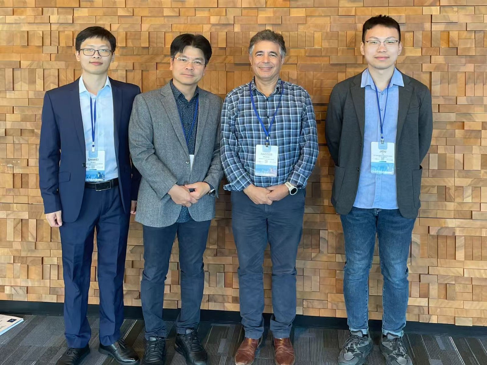 Dr. Shiwei Zhao, Prof. Ha H. Bui, Prof. Nasser Khalili and Jidu